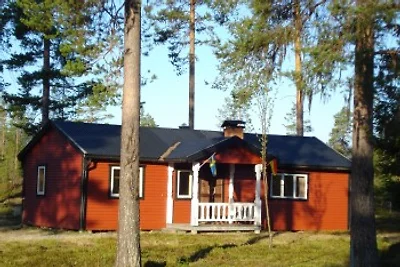 Haus am Lachsfluß in Lappland