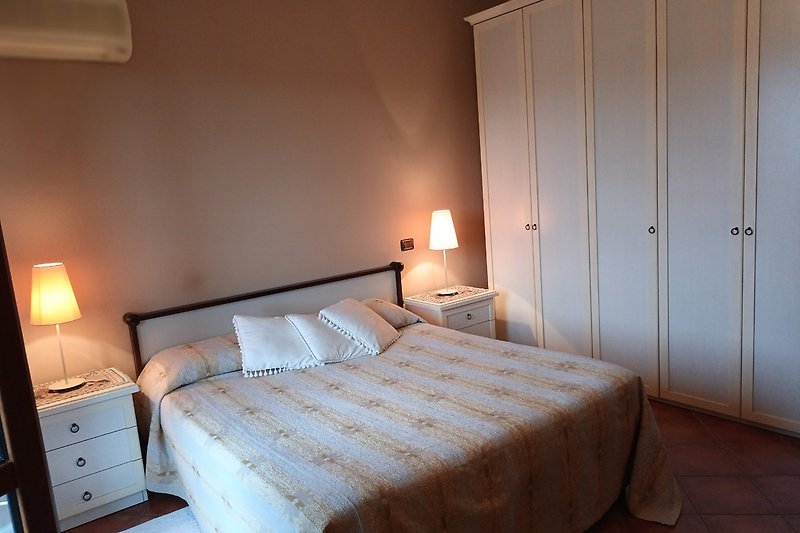 One of the double bedrooms. The second has twin beds. A third small bedroom is also available