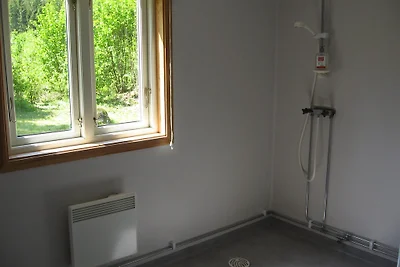 Casa vacanze sul lago con sauna, barca