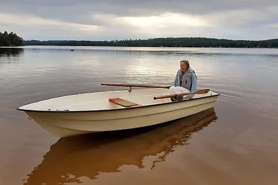 Casa vacanze sul lago con sauna, barca