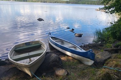 Vikendica na jezeru sa saunom, čamac