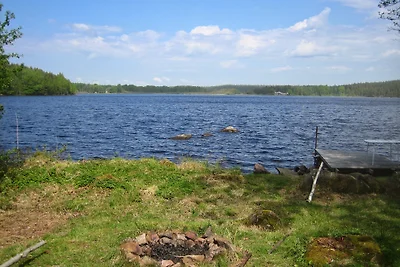 Casa vacanze sul lago con sauna, barca