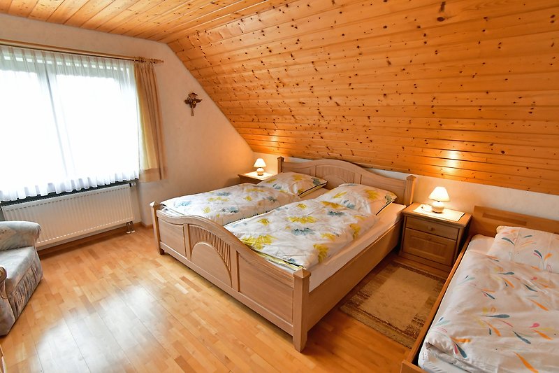Sypialnia w apartamencie wakacyjnym "Sternschnuppe"