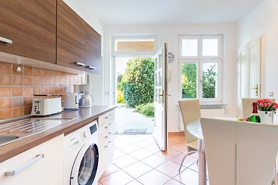 achterste appartement aan het strand met open haard