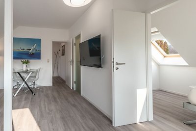 beachfront appartement water met terras