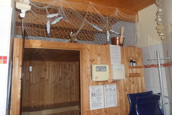 Fhaus Wattläufer, Sauna, Kaminofen in Norddeich - Firma Wattferien GbR
