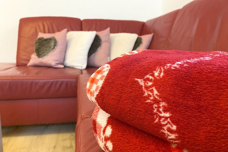 Wohnzimmer Anna-Lena mit gemütlicher Couch