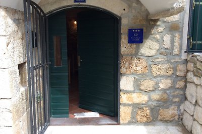 casa rústica de piedra Podgora