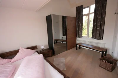 Ferienhaus am Wasser mit Bootssteg