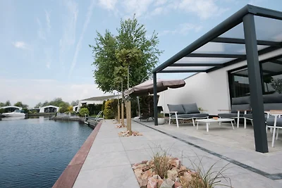 Bungalow am Wasser Eckgrundstück