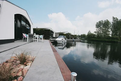 Bungalow am Wasser Eckgrundstück