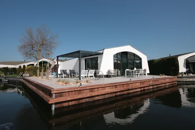 Bungalow am Wasser Eckgrundstück