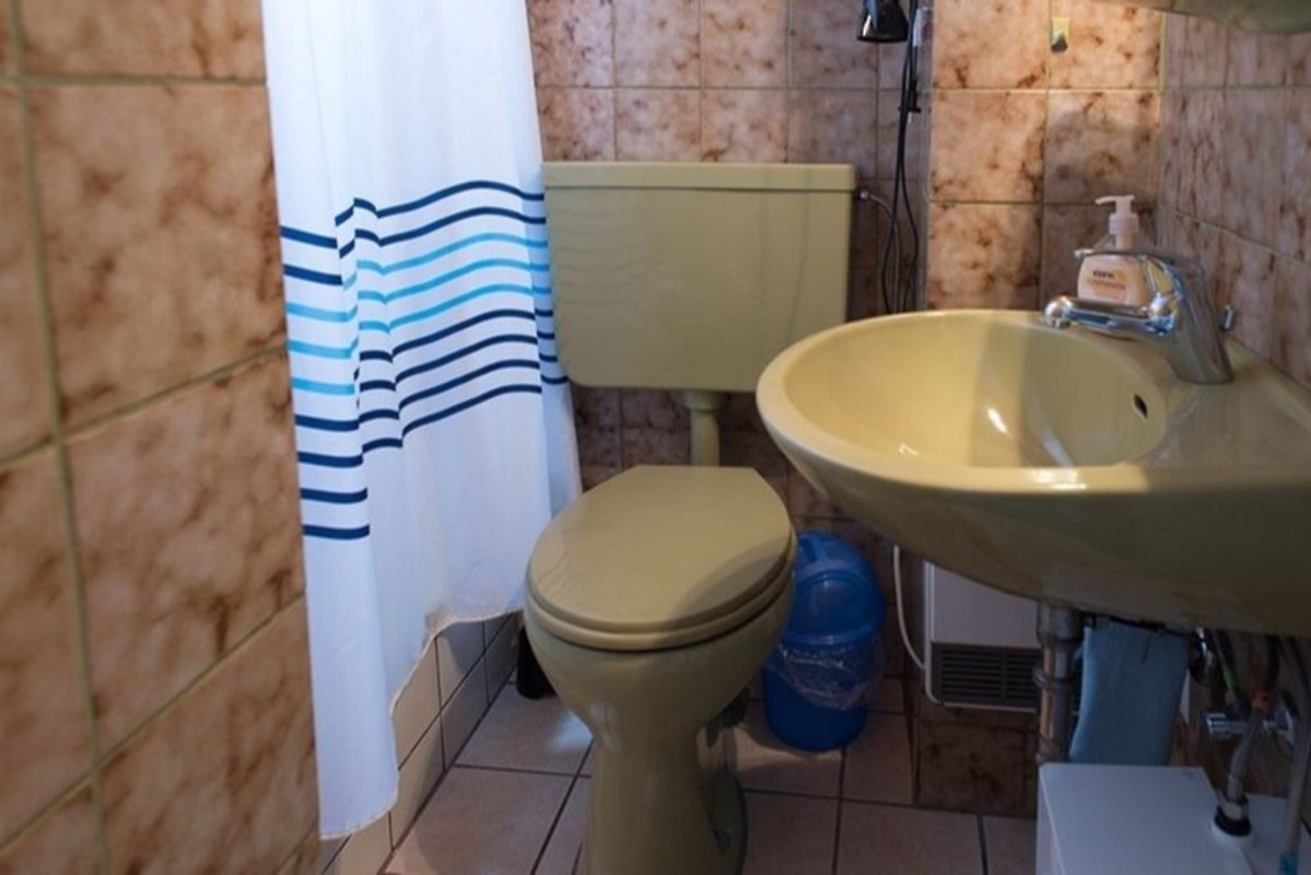 Kleines Ferienhaus mit Gartensauna in Esens - Frau M. Kutscher