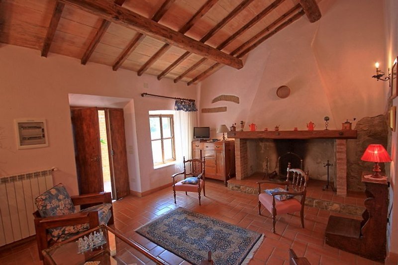 Maison de vacances Ars-Bernardinai, salle avec cheminée