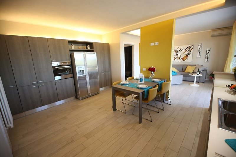 Kitchen with dining area on the ground floor.