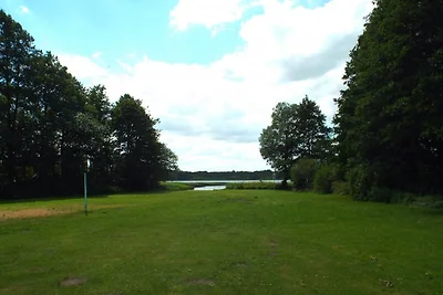 Bungalow direttamente sul lago balneabile e di pesca