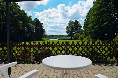 Bungalow direttamente sul lago balneabile e di pesca