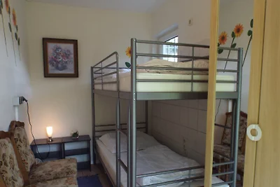 Bungalow direttamente sul lago balneabile e di pesca