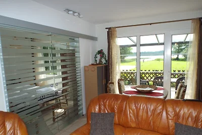 Bungalow direttamente sul lago balneabile e di pesca