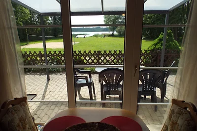 Bungalow direttamente sul lago balneabile e di pesca
