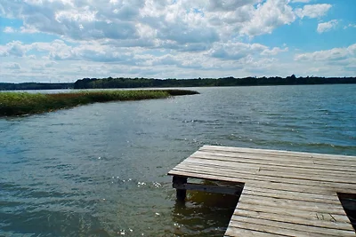 Bungalow unter Eiche direkt am See