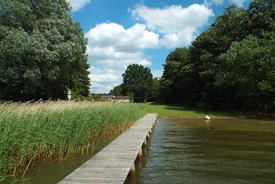 Bungalow unter Eiche direkt am See