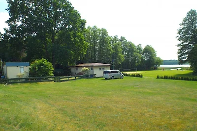 Bungalow unter Eiche direkt am See