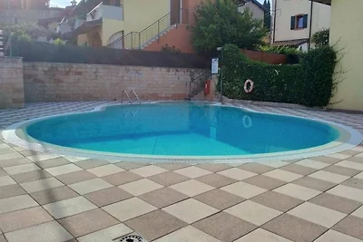 FEWO C 15 - KREIS LAZISE / GARDASEE MIT 50 m² PRIVATEM GARTEN & POOL!
