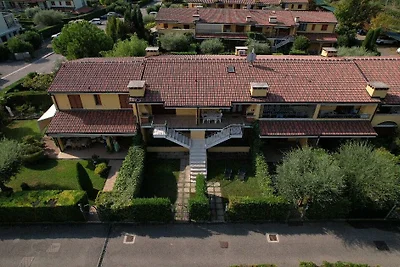 Appartamento C 46 al primo piano, con giardino e piscina