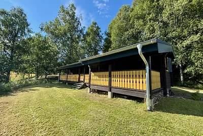 Blockhaus nahe Fredros mit Boot