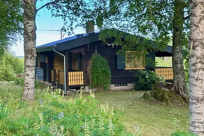 Blockhaus nahe Fredros mit Boot
