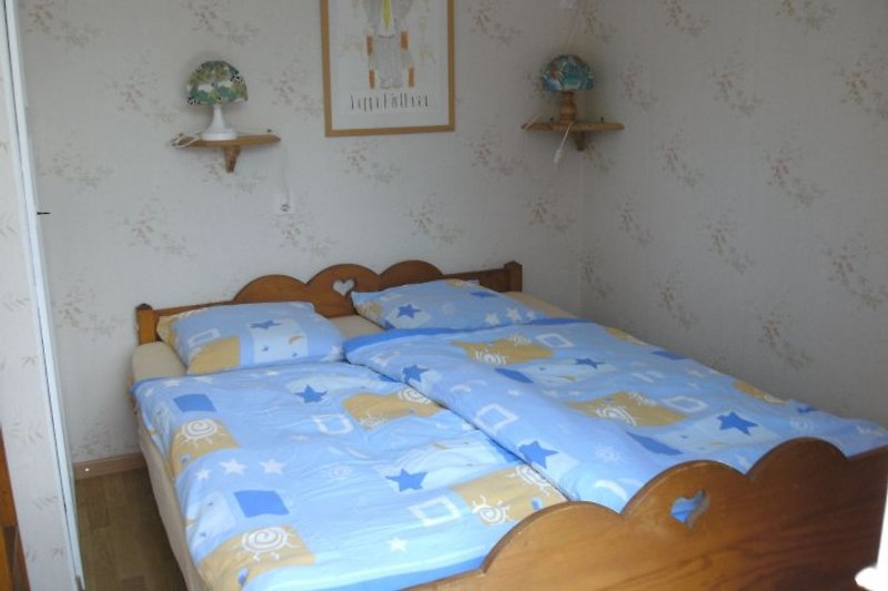 Schlafzimmer mit Französischem Bett