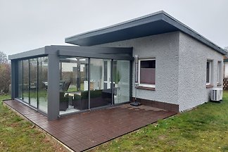 Bungalow con giardino d'inverno