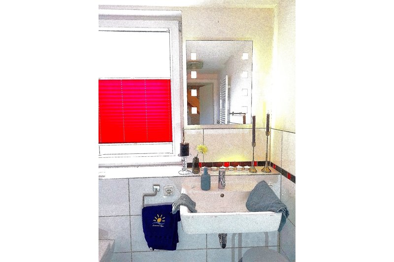 Spiegel, Waschbecken und Armatur in einem stilvollen Badezimmer