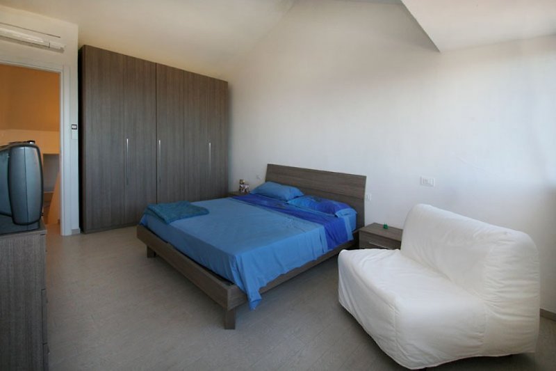 In the double bedroom there is an armchair bed as an additional bed