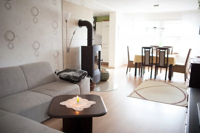 Whg.2 Woonkamer met open haard