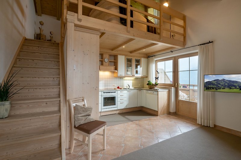 Wohnküche mit direktem Zugang zu Balkon 1 und Balkon 2