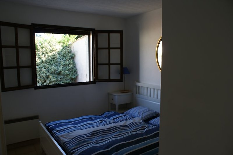Schafzimmer mit Doppelbett