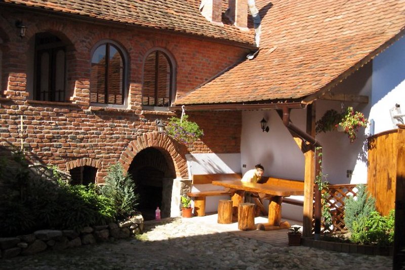 • CASA PELU • courtyard terrace • country house rental in a quaint Transylvanian village at the Romanian Carpathians