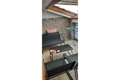 Haus am Meer mit Boot