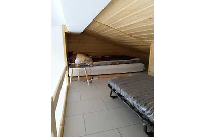 Haus am Meer mit Boot