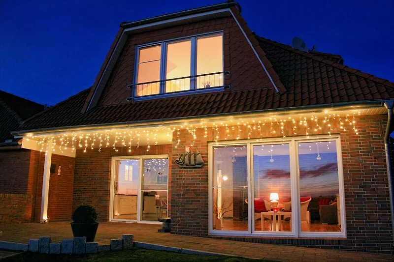 Droomvakantiehuis in adventsverlichting