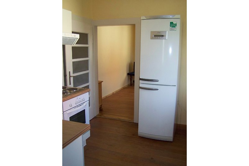 Kitchen with large refrigerator