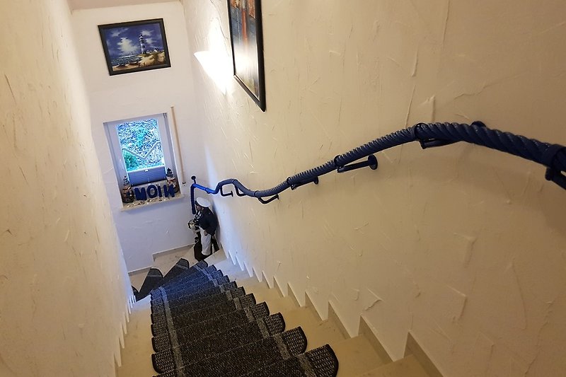 Treppenaufgang zu den Ferienwohnungen