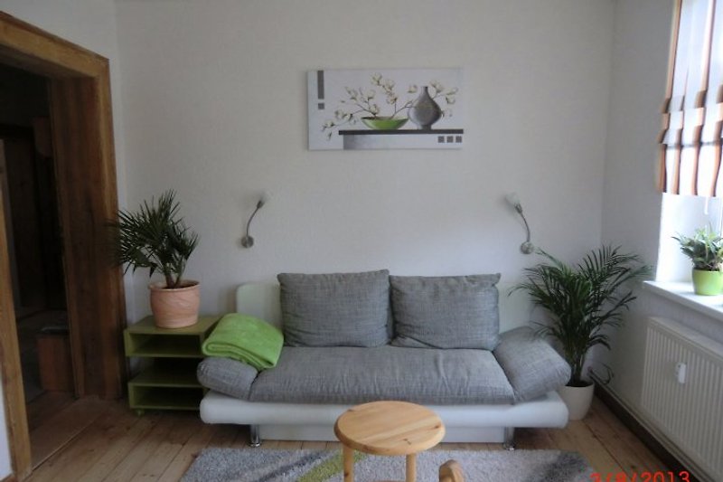 Erkerzimmer mit ausziehbarer Couch